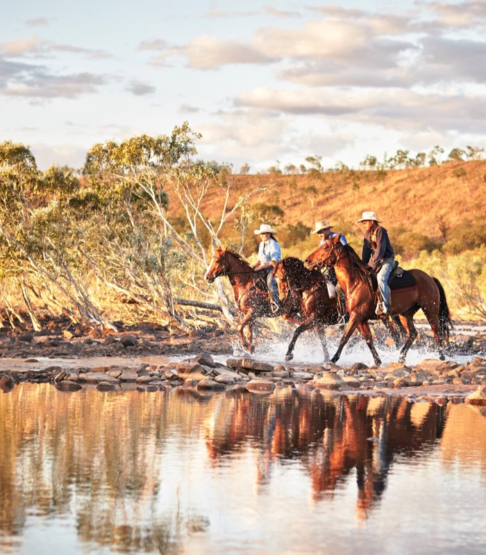 3 outback horse riders on a tour